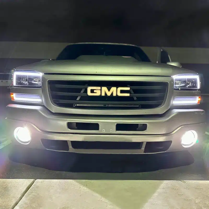 GMC light up grille emblem| LED GMC Light Up Grille Emblem GMC LED grille emblem — lighted GMC logo on front grille close-up